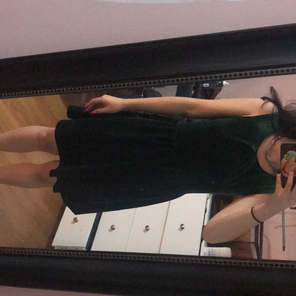 Emerald green velvet dress
